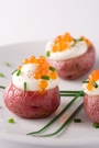 decorate garnish delicious red potatoes with gourmet salmon caviar